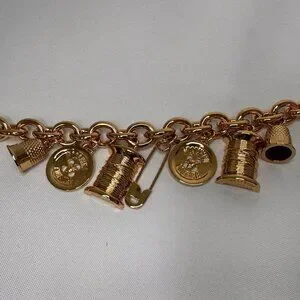 AW23 Moschino Couture Jeremy Scott Gold Dress Belt Multiple Logo Branded Button AW23 Moschino Couture Jeremy Scott Gold Sewing W/ Pins And  main image 2